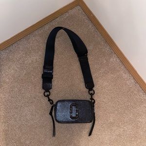 Solid black Marc Jacobs snap shot cross body bag